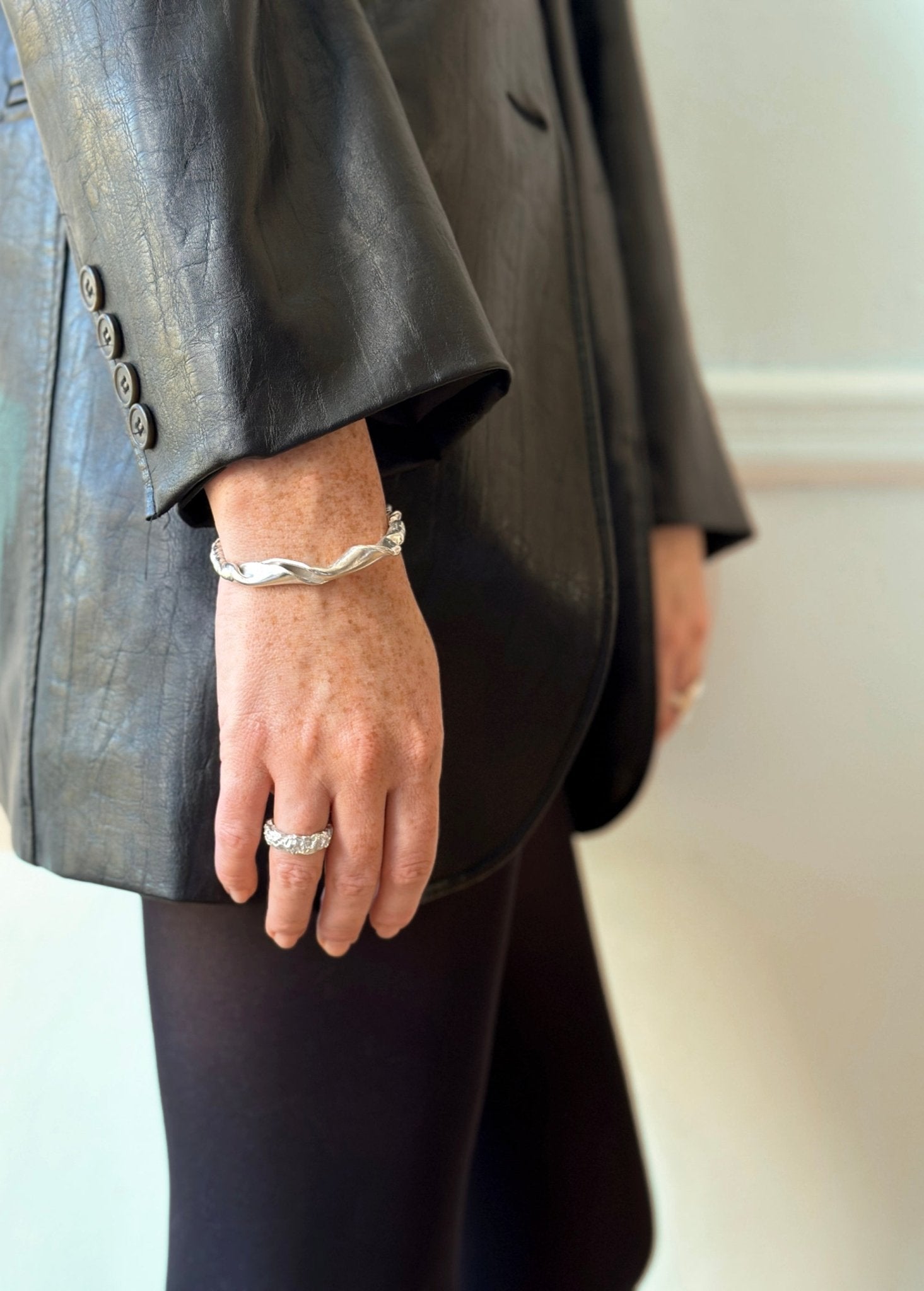 Women silver twisted cuff bracelet. Minimalist and modern jewelry made in Brooklyn New York by llayers.