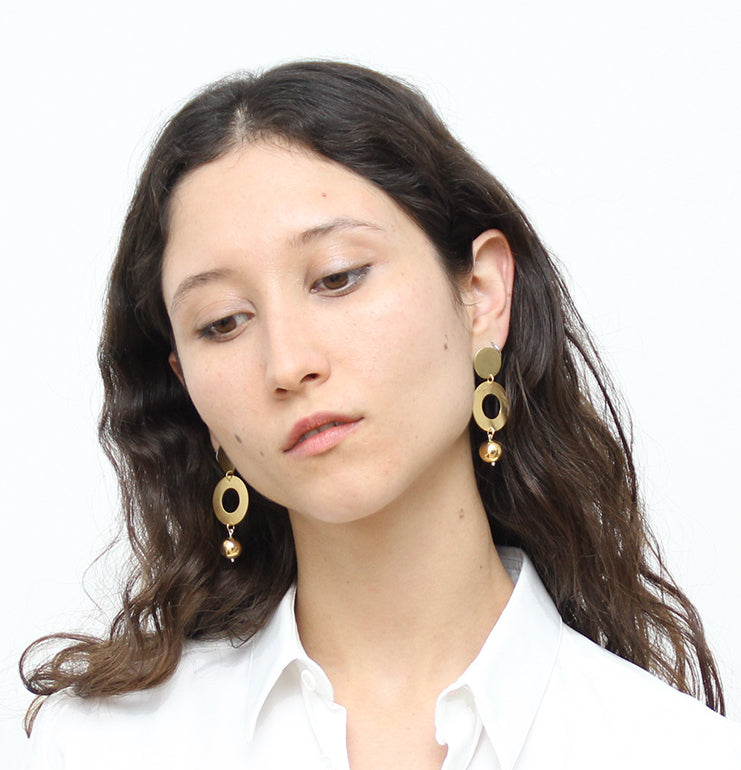 dangly gold plated sphere earrings satellite by llayers jewelry in Brooklyn New York