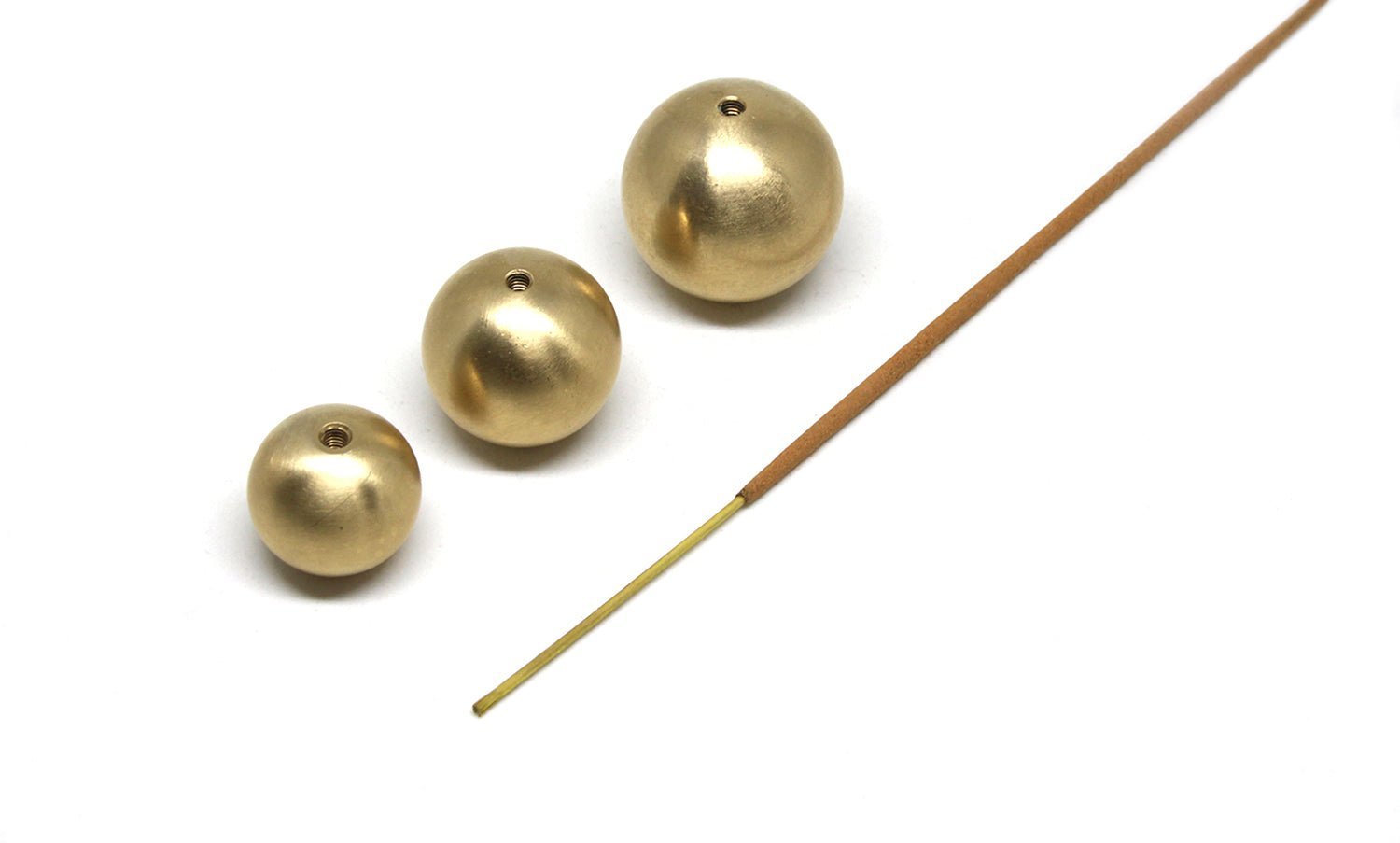 minimalist ball sphere incense burner orion brass llayers jewelry