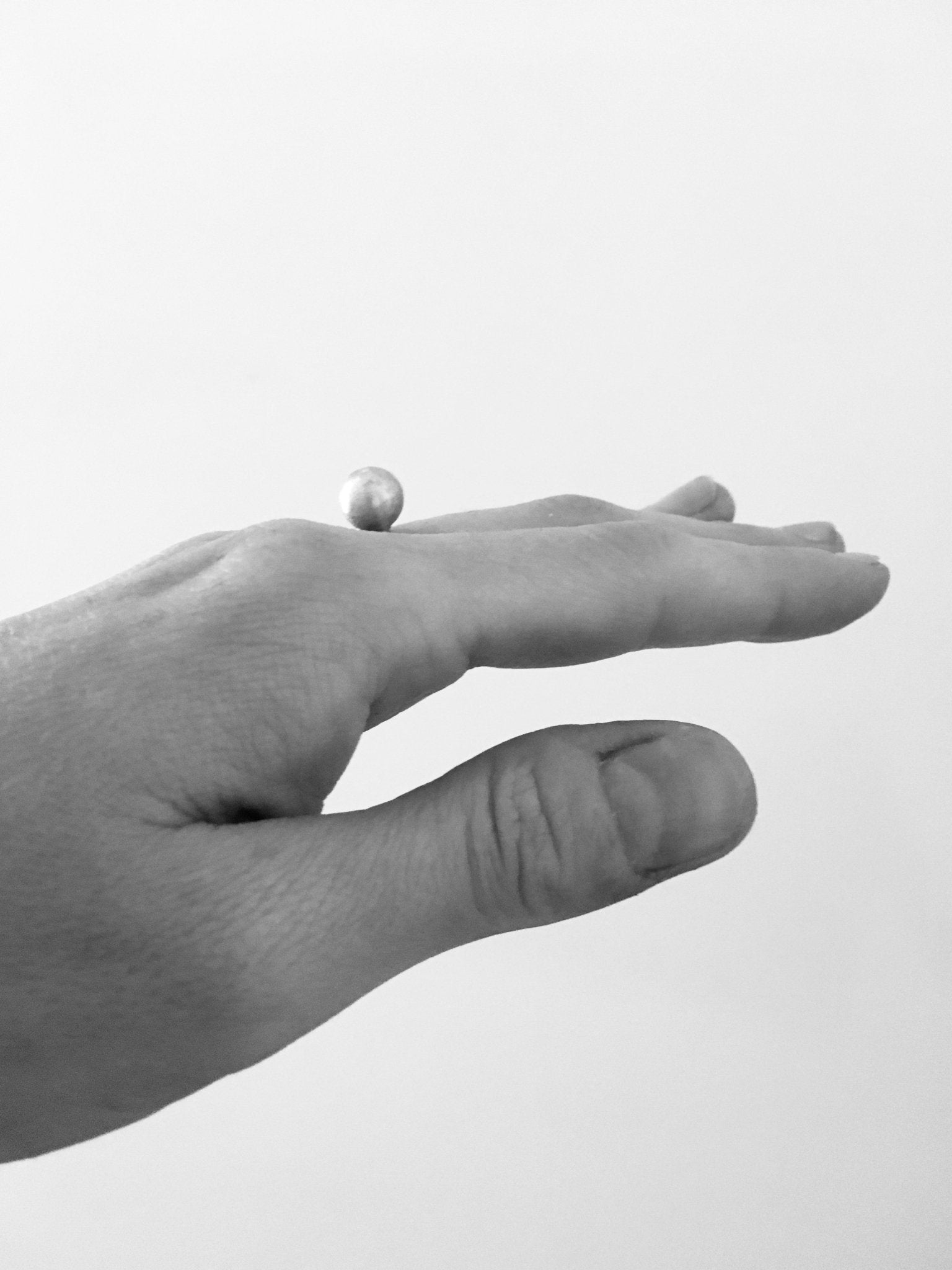 silver sphere ring in brooklyn New York by designer llayers jewelry