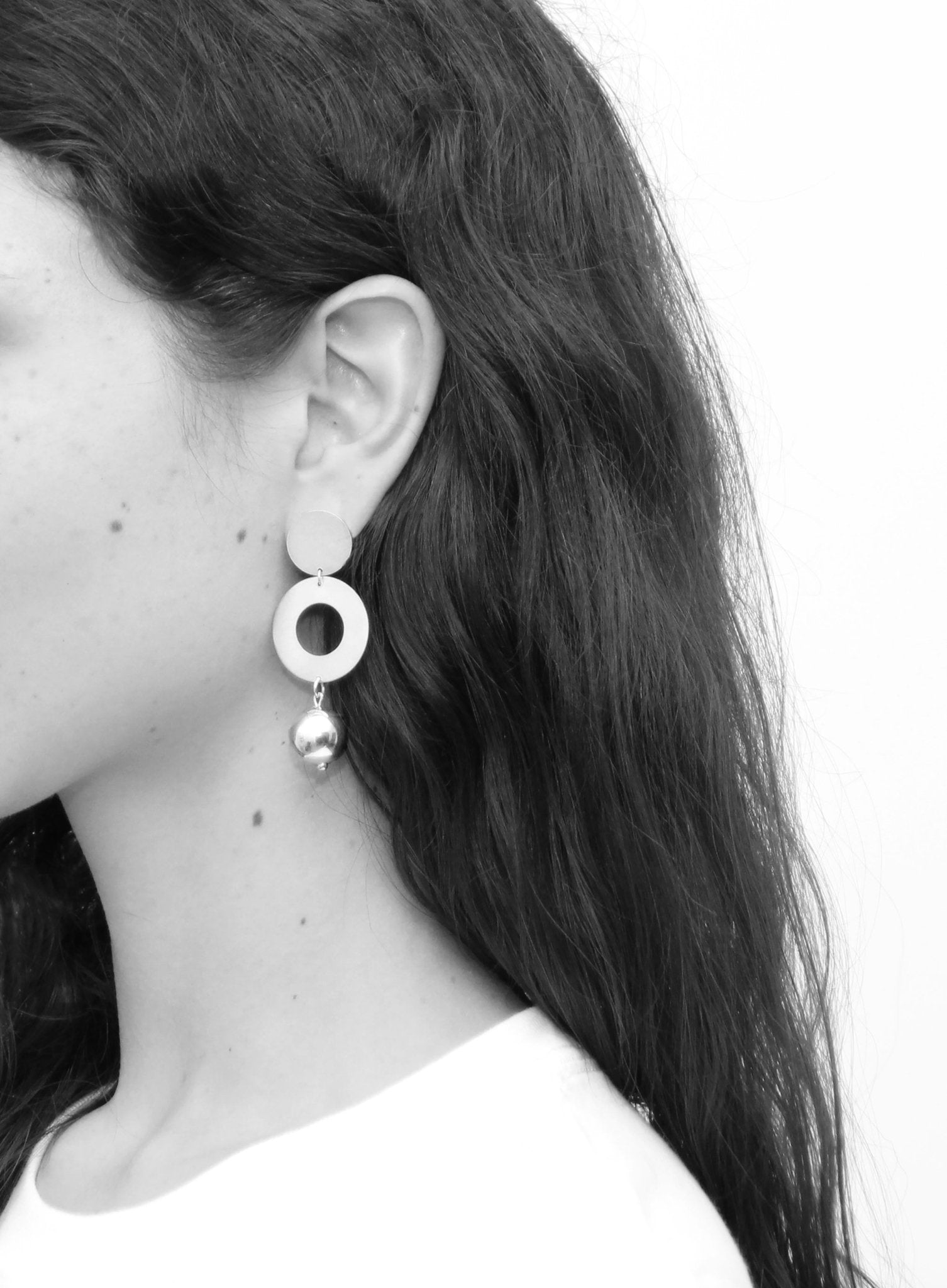 llayers jewelry dangly silver sphere earrings satellite in Brooklyn New York