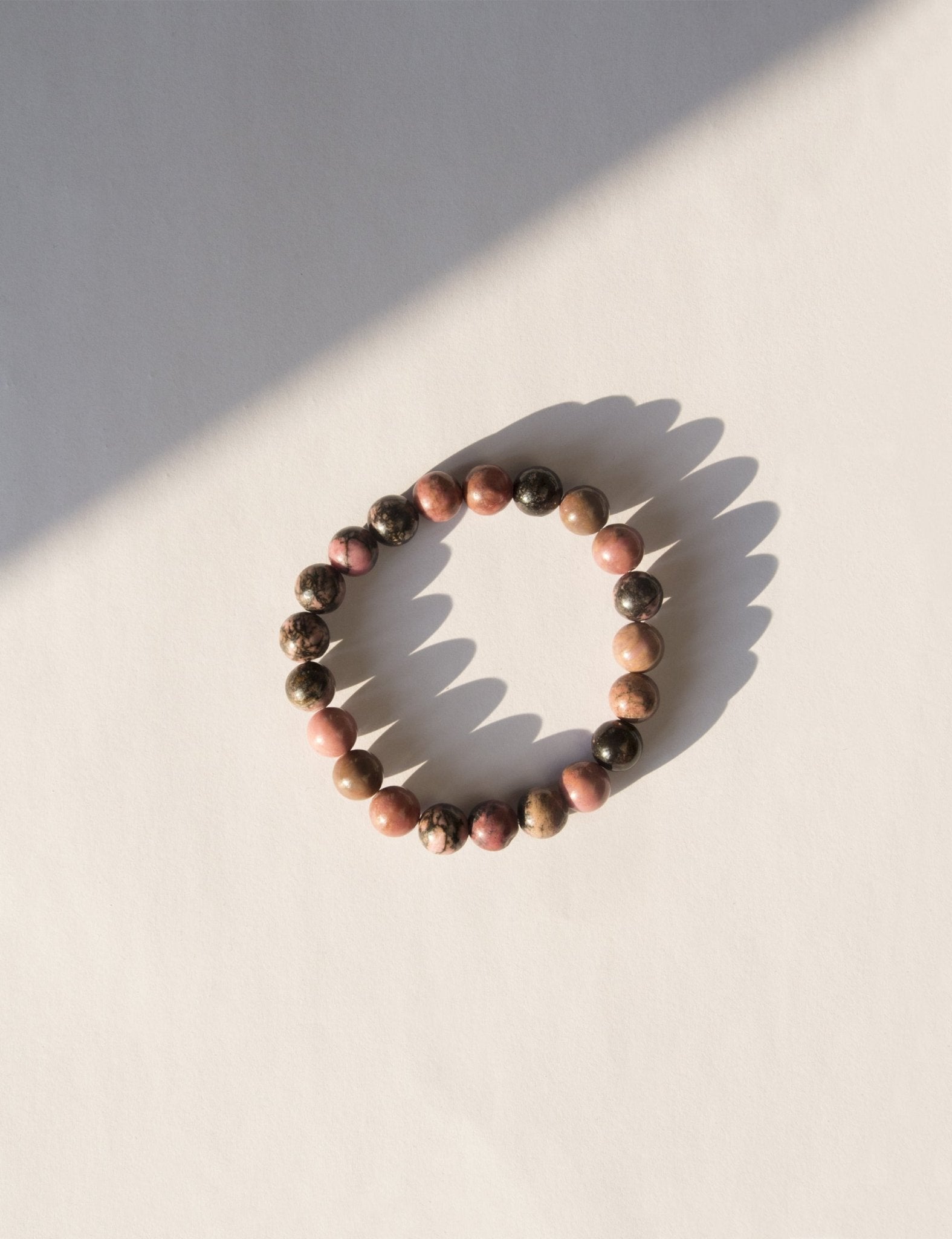 llayers bracelet avec pierres rondes rhodonite rose lithothérapie