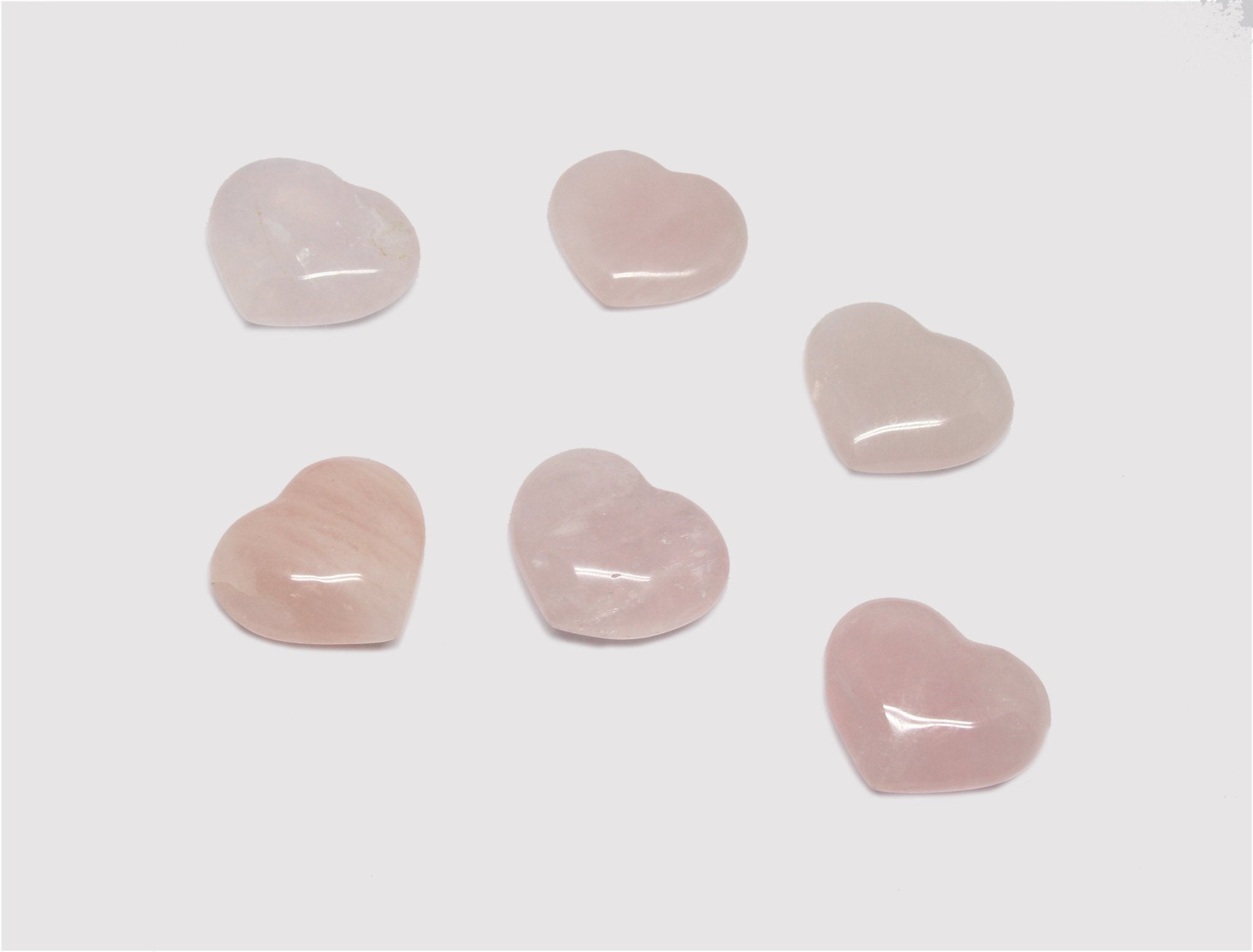 pink rose quartz crystal heart healing stone wellness by llayers in Brooklyn New York