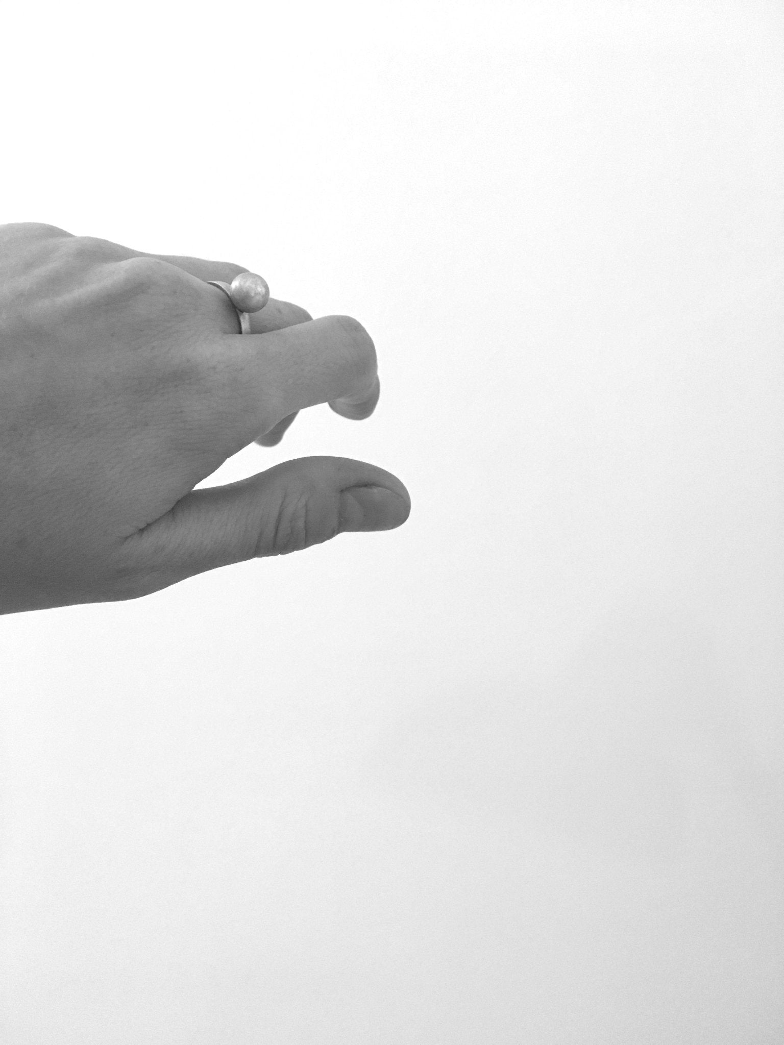 minimalist silver sphere ring in brooklyn New York by designer llayers jewelry